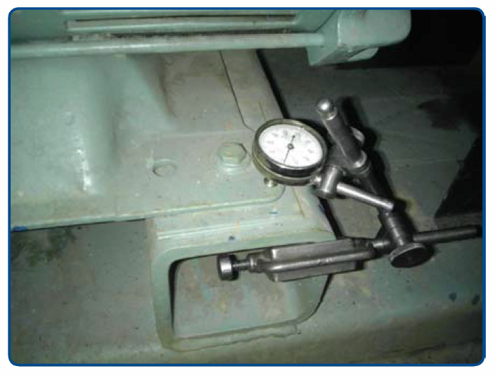 Dial indicator setup for soft foot test.